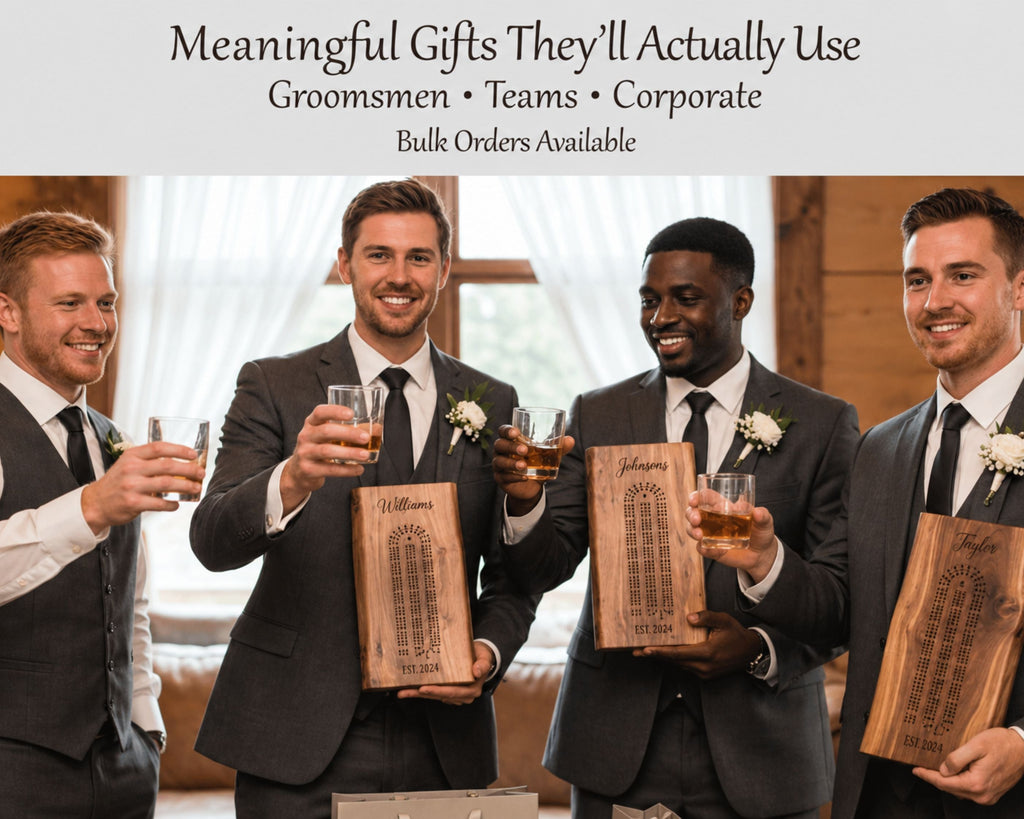 Four groomsmen in dark suits and vests toast while holding gifted cribbage boards. The top banner reads 'Meaningful Gifts They'll Actually Use Groomsmen • Teams • Corporate Bulk Orders Available'.