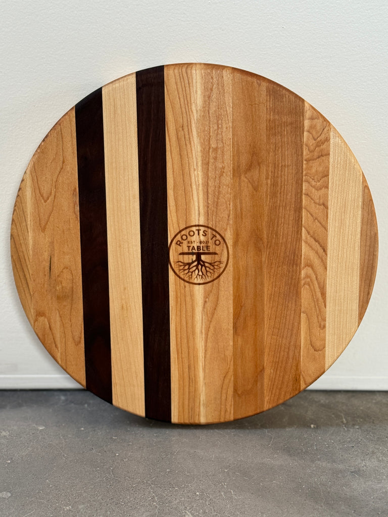 The Round 12x12 Edge Grain Maple & Walnut Accent Cutting Board