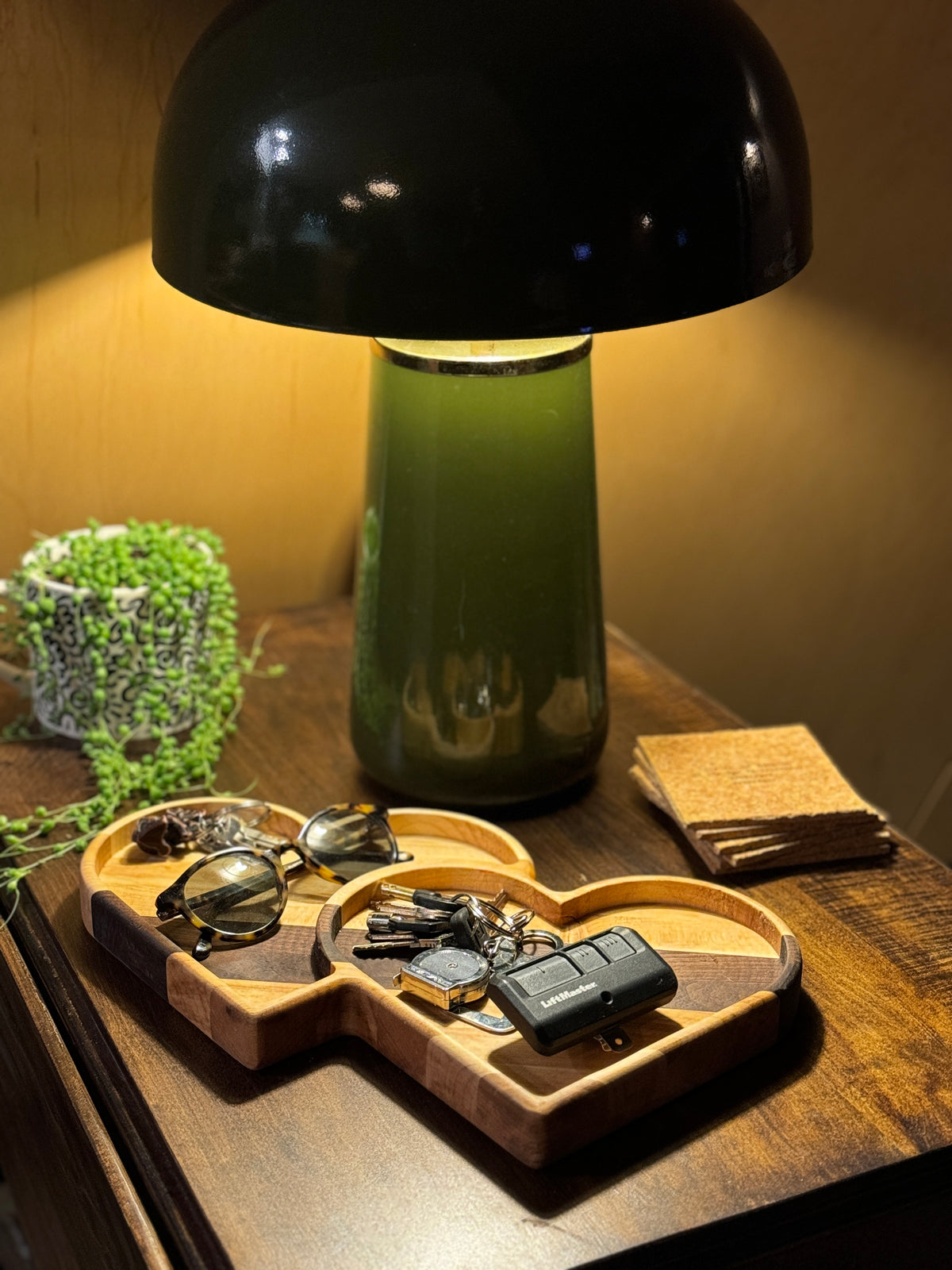 Wooden catch all tray used to keep daily items safe and neat.