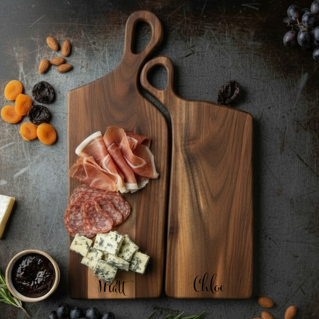 Personalized nesting charcuterie board set with engraved names styled with artisan meats and cheeses