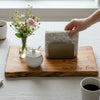 Cherry live edge decorative tray with serviettes, sugar bowl and wildflowers