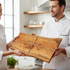 a personalized wrapped cherry live edge charcuterie board being gifted from one chef to another.
