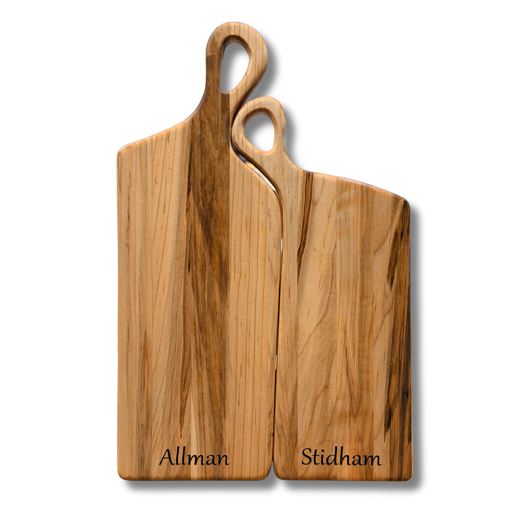 Personalized nesting cheese board set in maple wood with engraved names for newlywed gifts