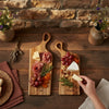 Personalized nesting charcuterie board engraved with couple names styled for intimate entertaining