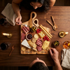 Overhead view of personalized nesting charcuterie board set prepared for entertaining and gifting couples