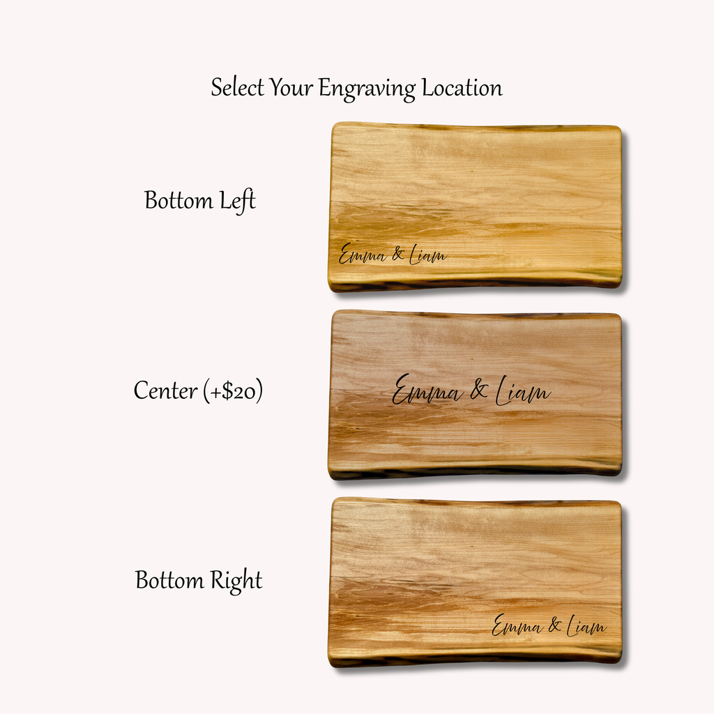 Three wooden cheese boards with engraved text 'Emma & Liam' showing different locations for personalization.