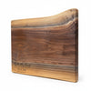 Wooden cutting board with engraved text highlighting colour variation and grain pattern of these custom charcuterie boards