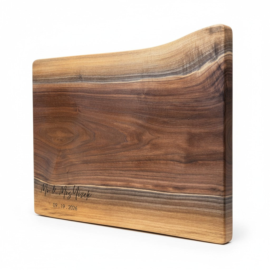 Wooden cutting board with engraved text highlighting colour variation and grain pattern of these custom charcuterie boards